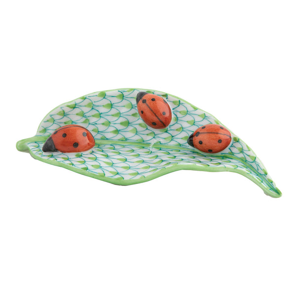 Ladybugs On Leaf