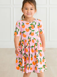 Girls Orange You The Sweetest Short Sleeve Knit Twirl Dress